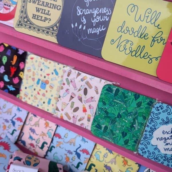 Collection of colourful coaster on a pink brackgound from Fay Dixon Design