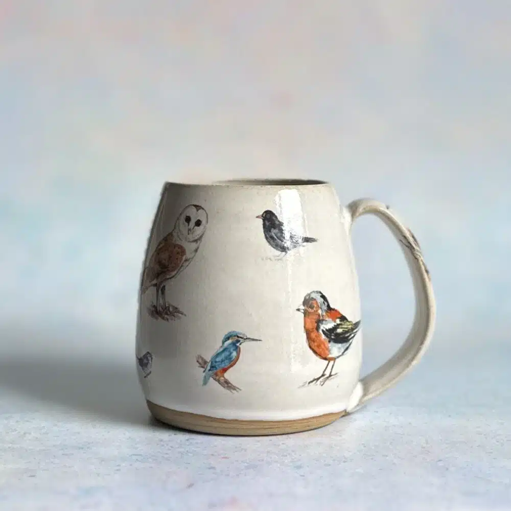 handmade ceramic mug decorated with british birds