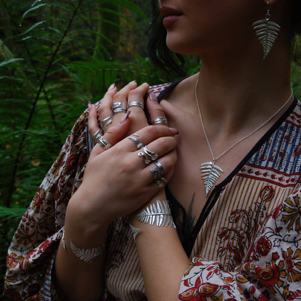 Our model wears Rooks & Roses fern collection; handmade silver jewellery.