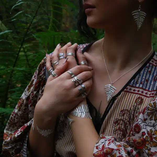 Our model wears Rooks & Roses fern collection; handmade silver jewellery.
