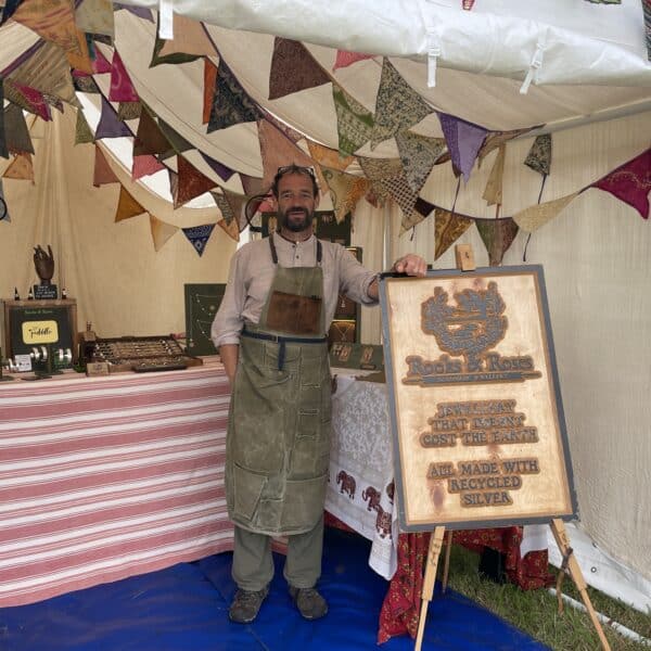 Karl Smith at his Rooks & Roses festival jewellery stall