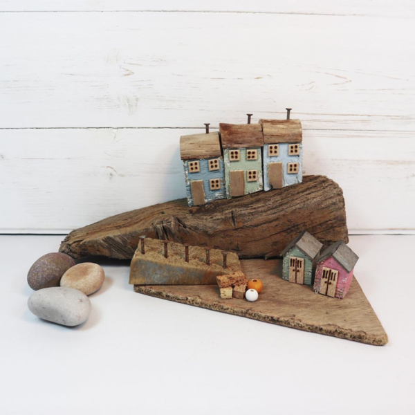 Salty Seas, Coastal houses made from drift wood.