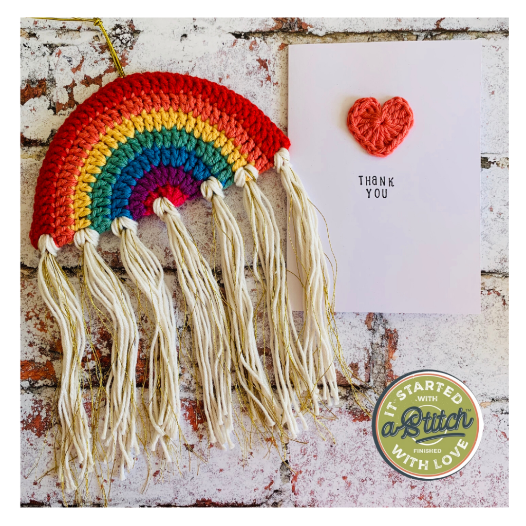 Tasselled crochet rainbow with matching heart design card