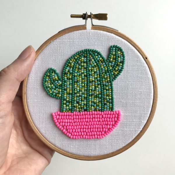 Hand beaded cactus in neon pink pot wall decoration