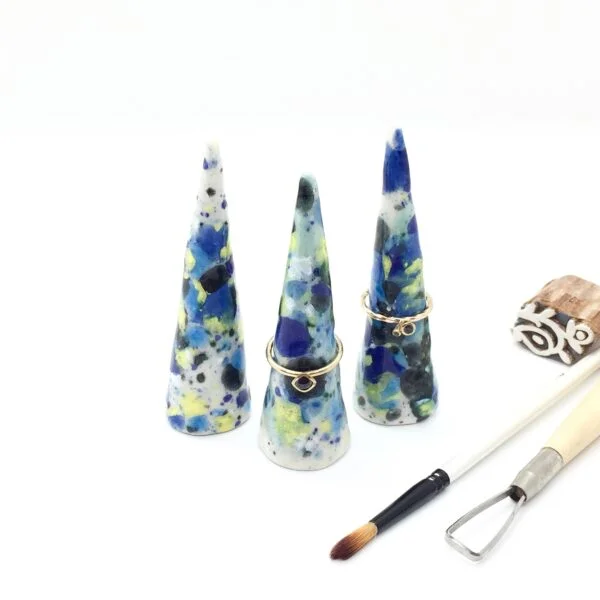 Precious Clay Studio, ring cones bursting blue and yellow glaze