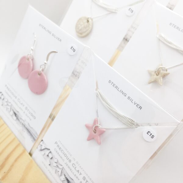 Precious Clay Studio ceramic star necklaces pink and oatmeal