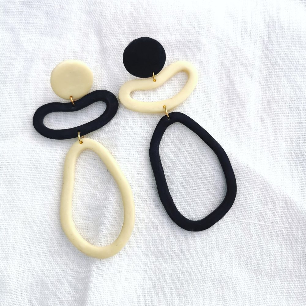 Audrey and george nude and black topsy turvy hoop mismatched polymer clay earrings