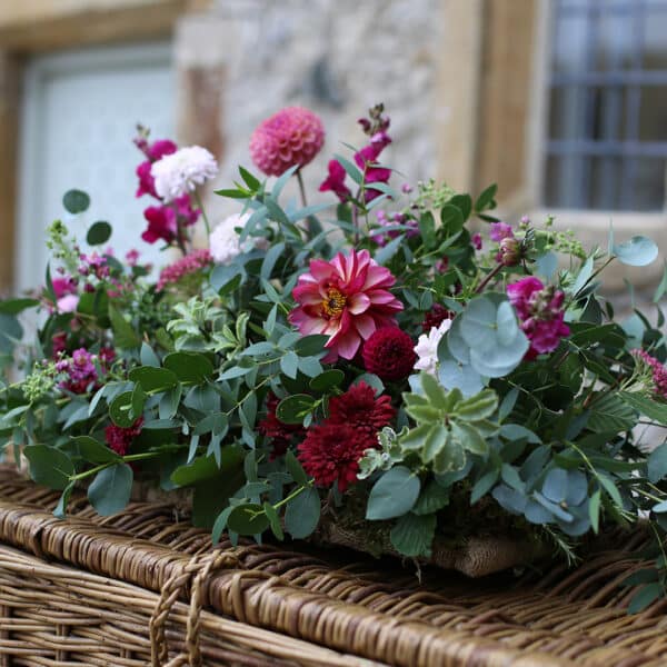 a spray arrangement of British grown flowers by wild soul flowers