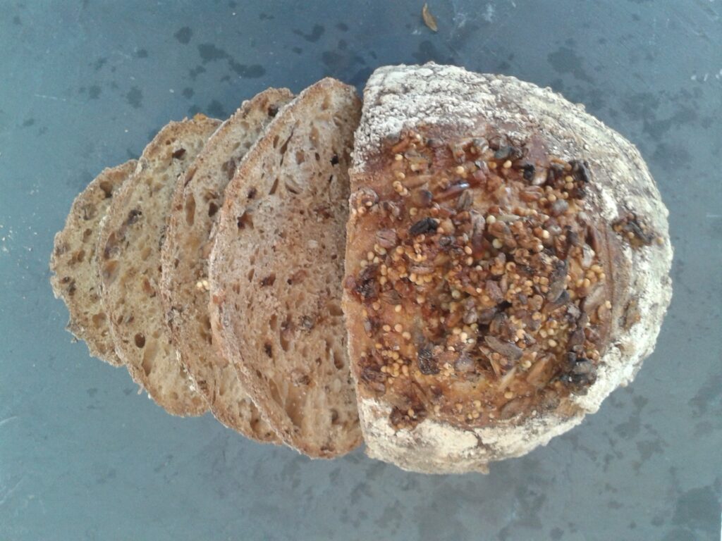 The Epsom Bakehouse seeded malted sourdough loaf, sliced