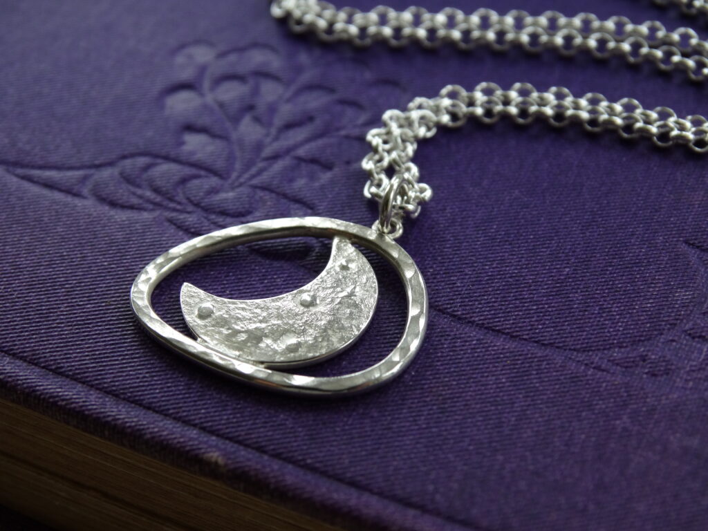 Embossed textured crescent moon pendant in recycled silver by silver nutmeg