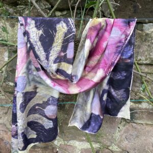 By Maggie Naturally. Large silk scarf/shawl, hand printed with fig leaves, cotinus and acers, handdyed with weld, logwood and cochineal