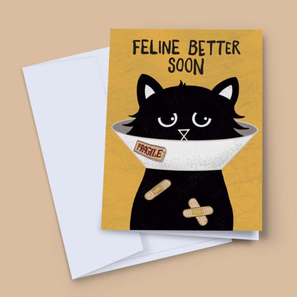 “Feline Better Soon get well soon card featuring a black cat wearing a cone of shame with a fragile sticker and plasters, bold textured illustration, blank inside, 7x5 inches.