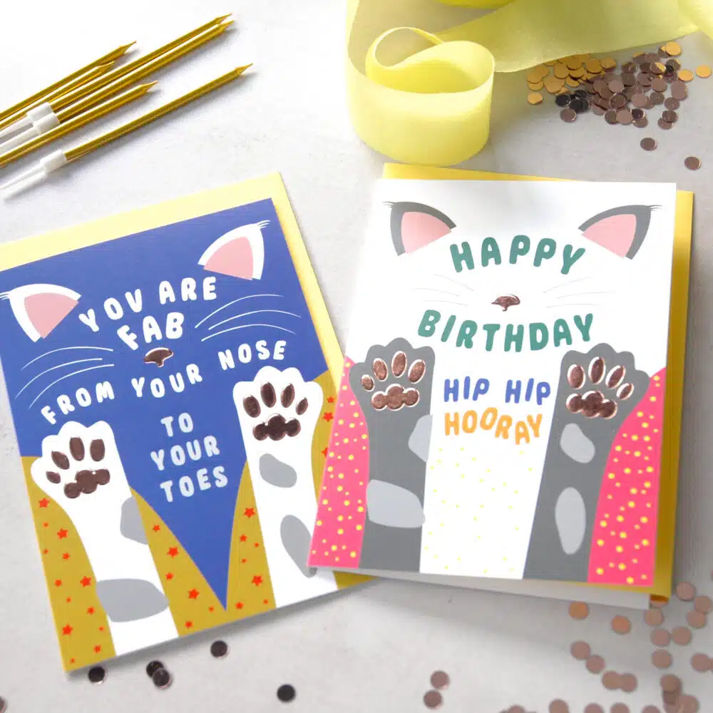 Two greetings cards with cats on with foiled paws and nose