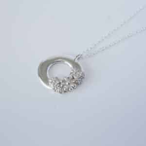 Abby's Art Atelier. Handmade, fine silver flower necklace with sterling silver chain.