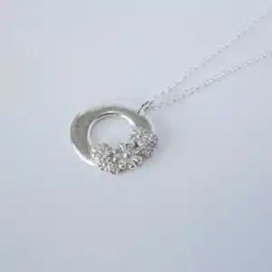 Abby's Art Atelier. Handmade, fine silver flower necklace with sterling silver chain.