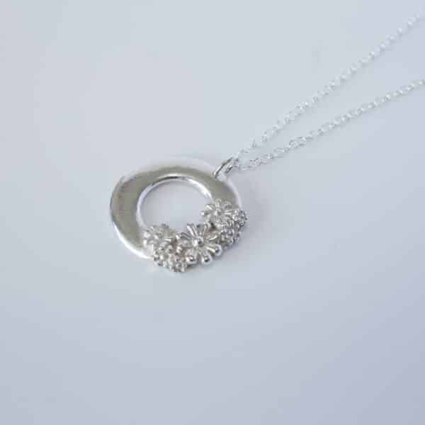 Abby's Art Atelier. Handmade, fine silver flower necklace with sterling silver chain.