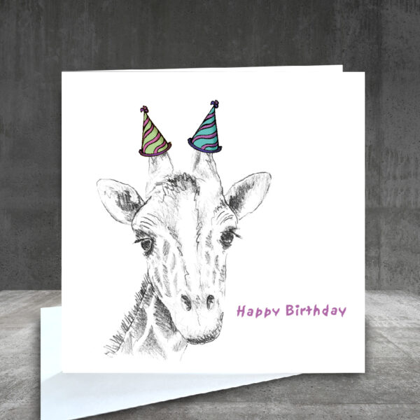 Giraffe birthday card with party hats