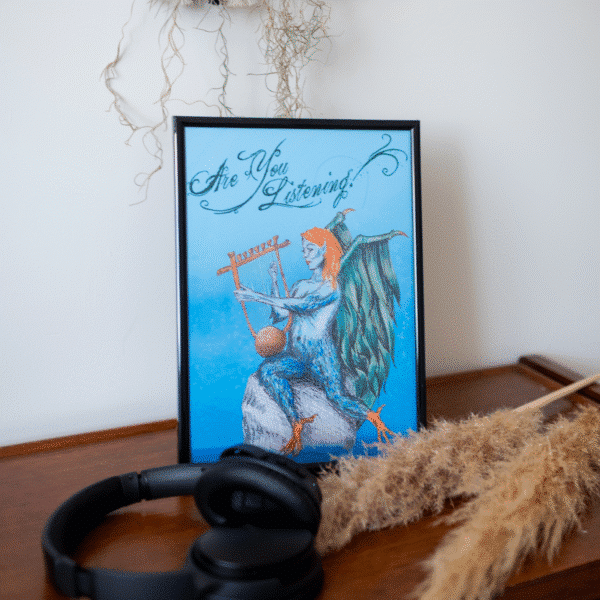 Art print displayed in a frame. The art shows a Siren or Harpy sitting on a rock playing a lyre. The text above the creature reads "Are You Listening?"