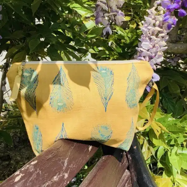 Raina Atelier Yellow Peacock Feathers Linen Makeup Bag and Raina Atelier Yellow Linen Peacock Feathers Zip-Up Pouch