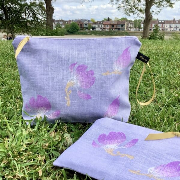 Raina Atelier Lilac Magnolias Linen Makeup Bag and Raina Atelier Lilac Linen Magnolias Zip-Up Pouch