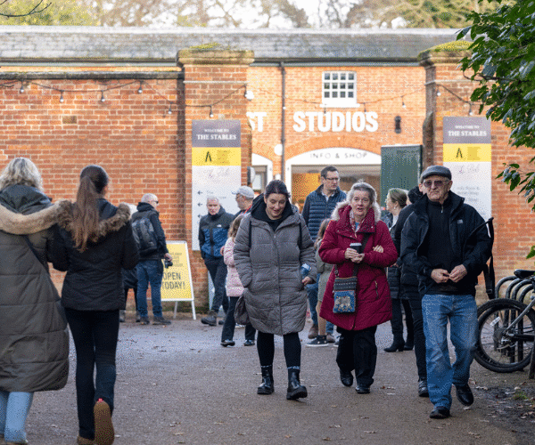 Visitors walking into and out of The Stables at Hylands Estate.