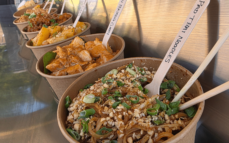 A close up of a selection of Thai dishes.
