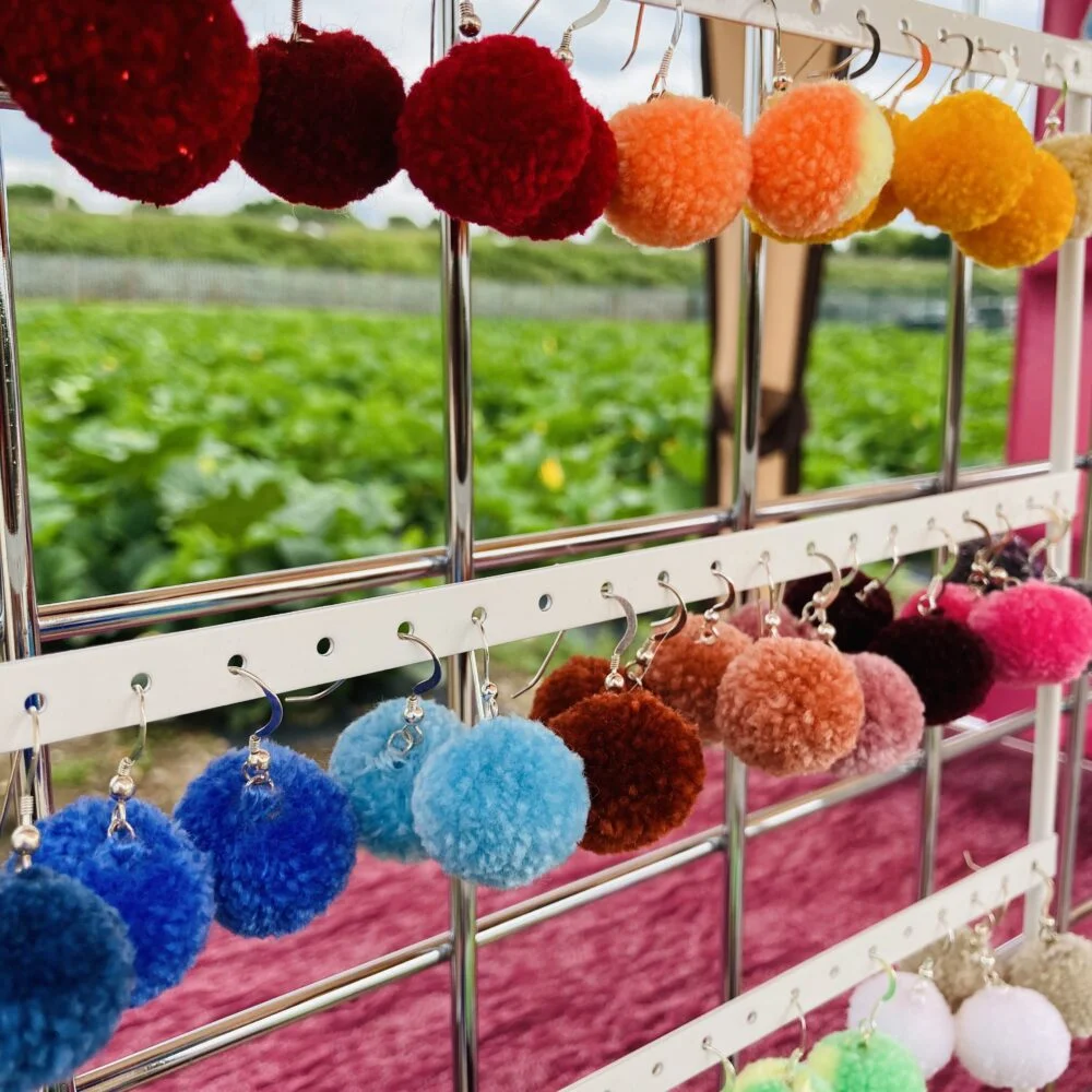 Pom Pom Earrings at Canalside Market.