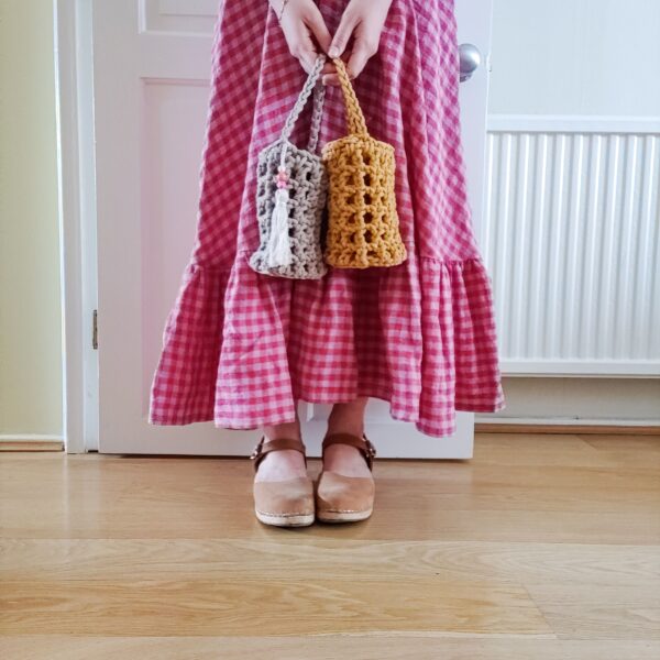 My Ivory Room, crochet net bag with pink tassel in mustard and sand