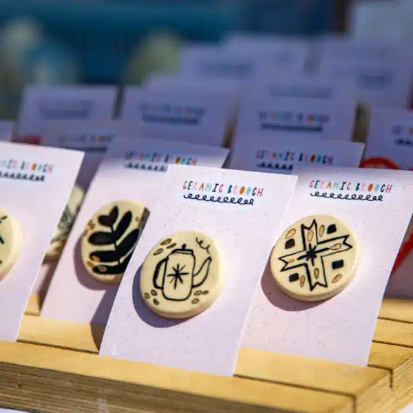 Ceramic brooches in the sunshine