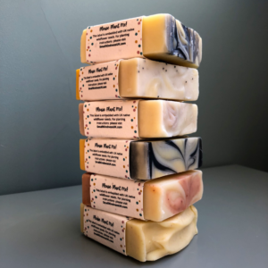 A stack of Six Handcrafted Natural Soaps by Small Kindness