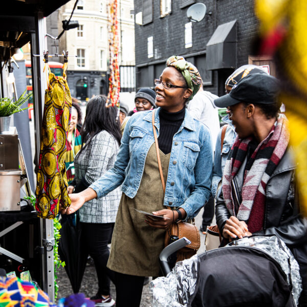 Customers shopping at the Black Owned Market with Bohemia Place