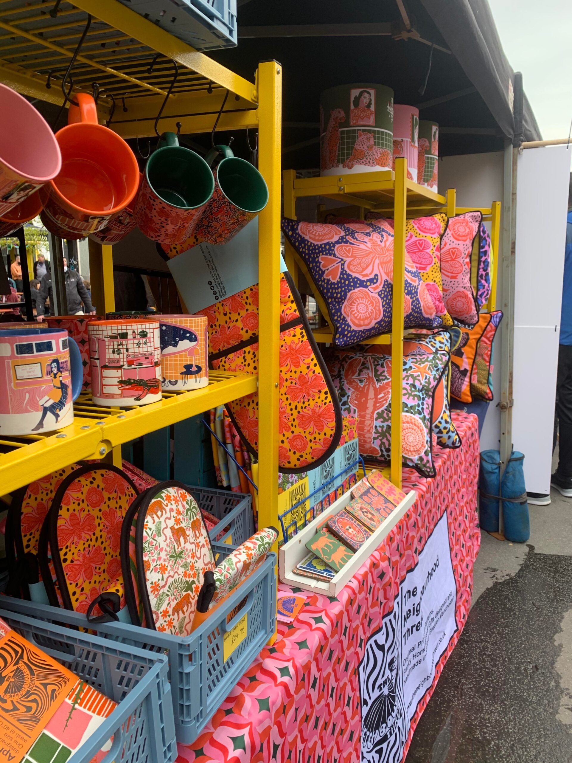 A display of colourful homewares on a stall at the Northern Quarter Makers Market in Manchester