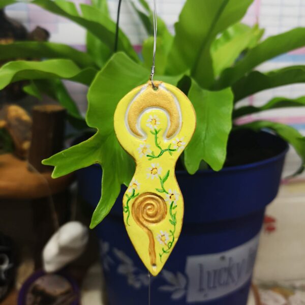 Bythecrookofmyhook yellow lunar goddess plant pot companion, stake added to a plant pot.