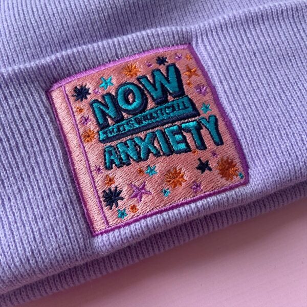Now that’s what I call music anxiety knitted embroidered beanie in lilac by ellastrated