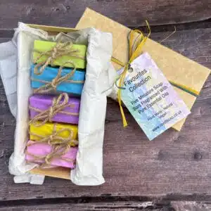 A gift box containing 5 mini soap bars wrapped up