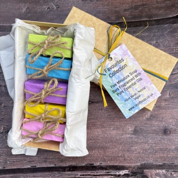A gift box containing 5 mini soap bars wrapped up