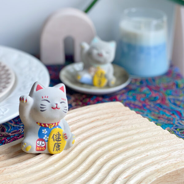 Japanese lucky cat Maneki-neko made by concrete with lovely hand paints