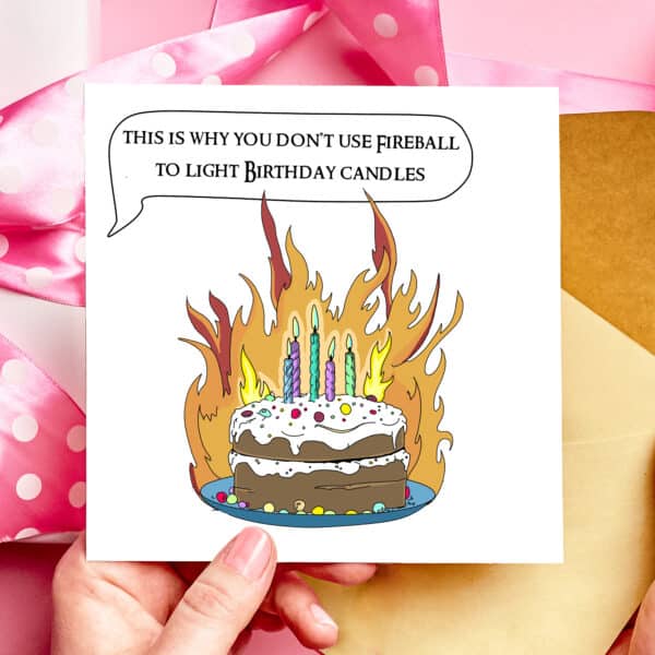 Illustrated birthday card with a birthday cake on fire, and the message "this is why you don't use fireball to light birthday candles" DnD Birthday Card