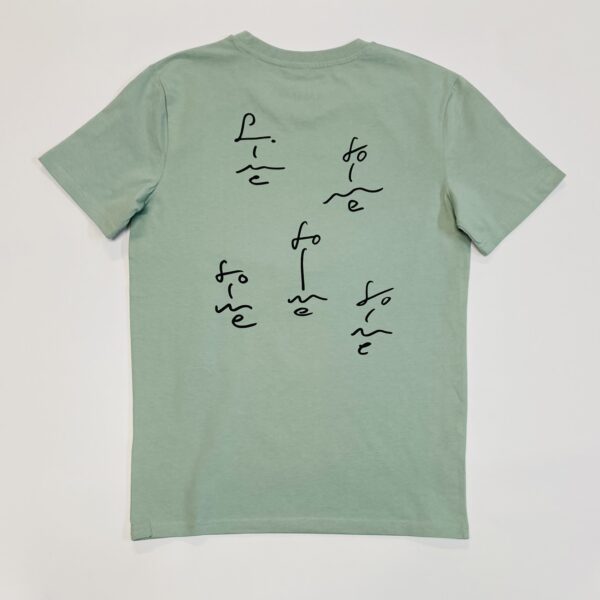 Olive green t-shirt that has a back print featuring five different abstract faces created by using the letters from Forme