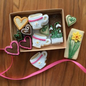 tea cup shortbread biscuits with daffodil, hearts and snowdrops gingerbread biscuits