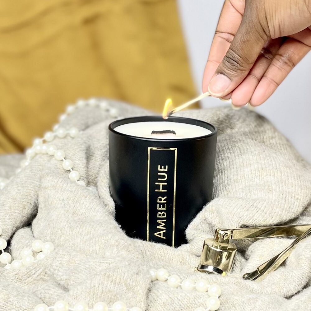 Amber Hue Candles, Large s shaped wood wick candle burning