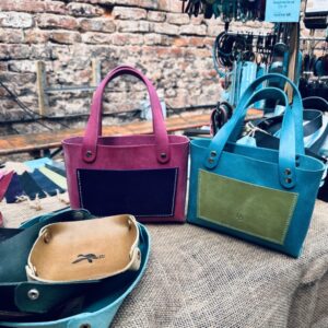 Pink and turquoise leather tote bags