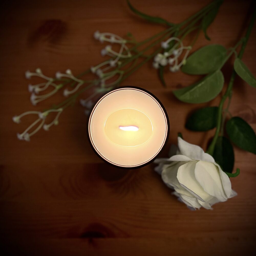 Amber Hue Candles, Large s shaped wood wick candle burning