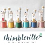 Thimbleville - cute cotton reel and wooden houses and a daisy, handmade gift