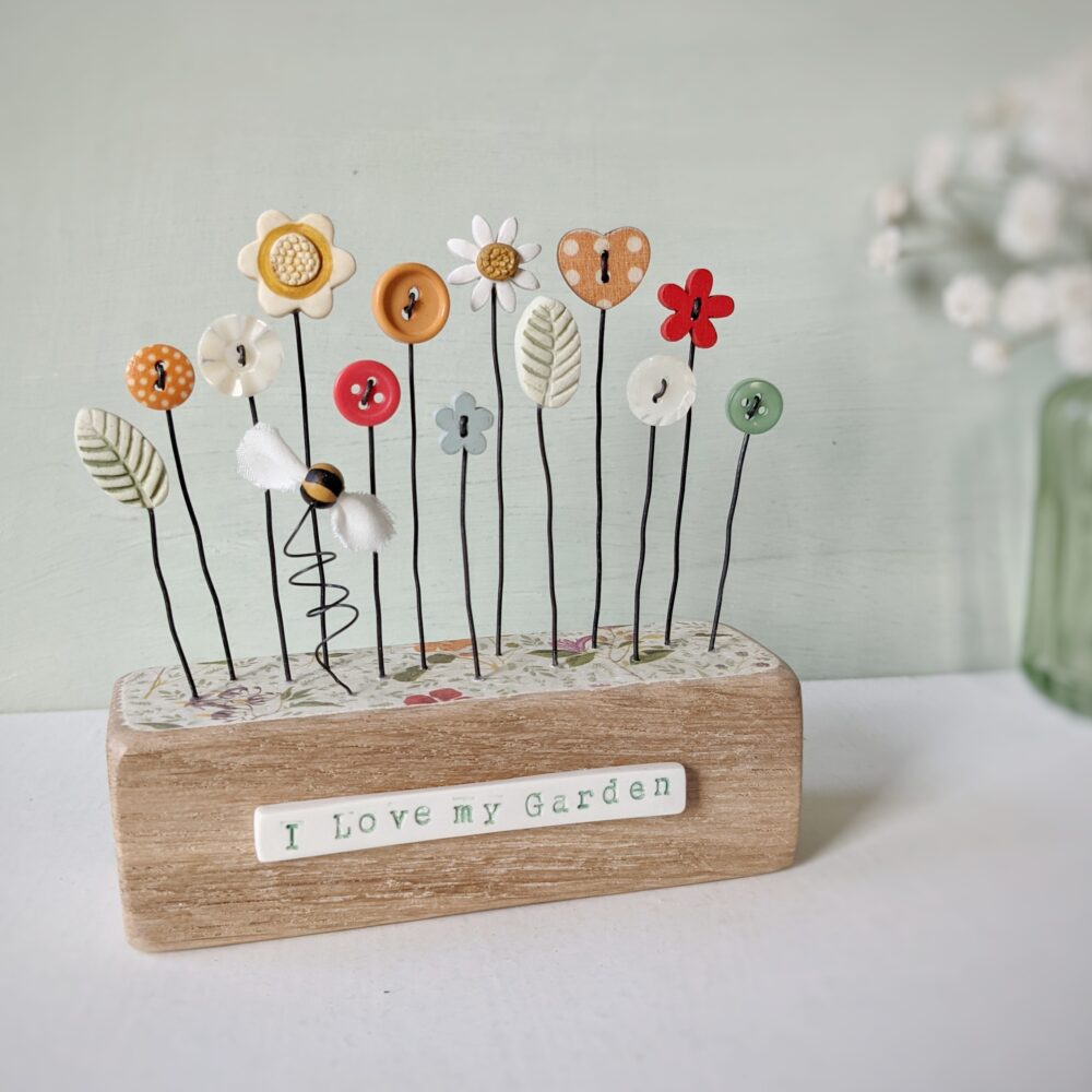 Button and clay flower garden