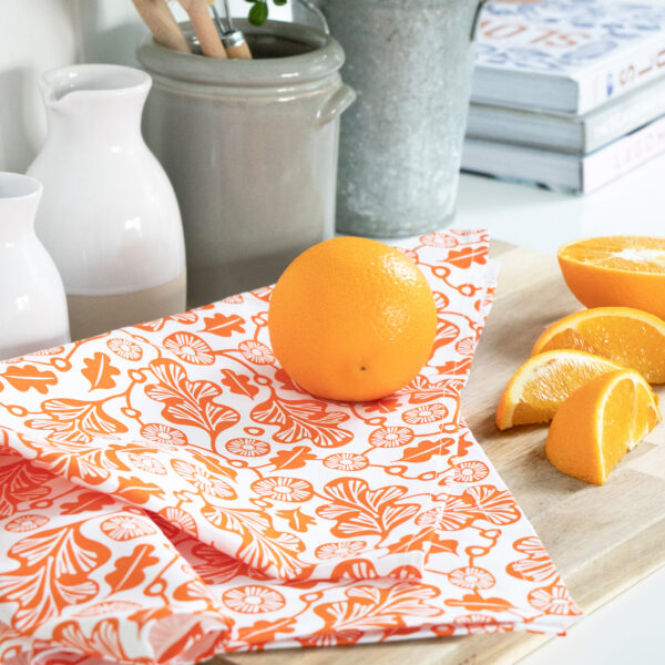 Pasoluna cotton tea towel in orange oak leaf print