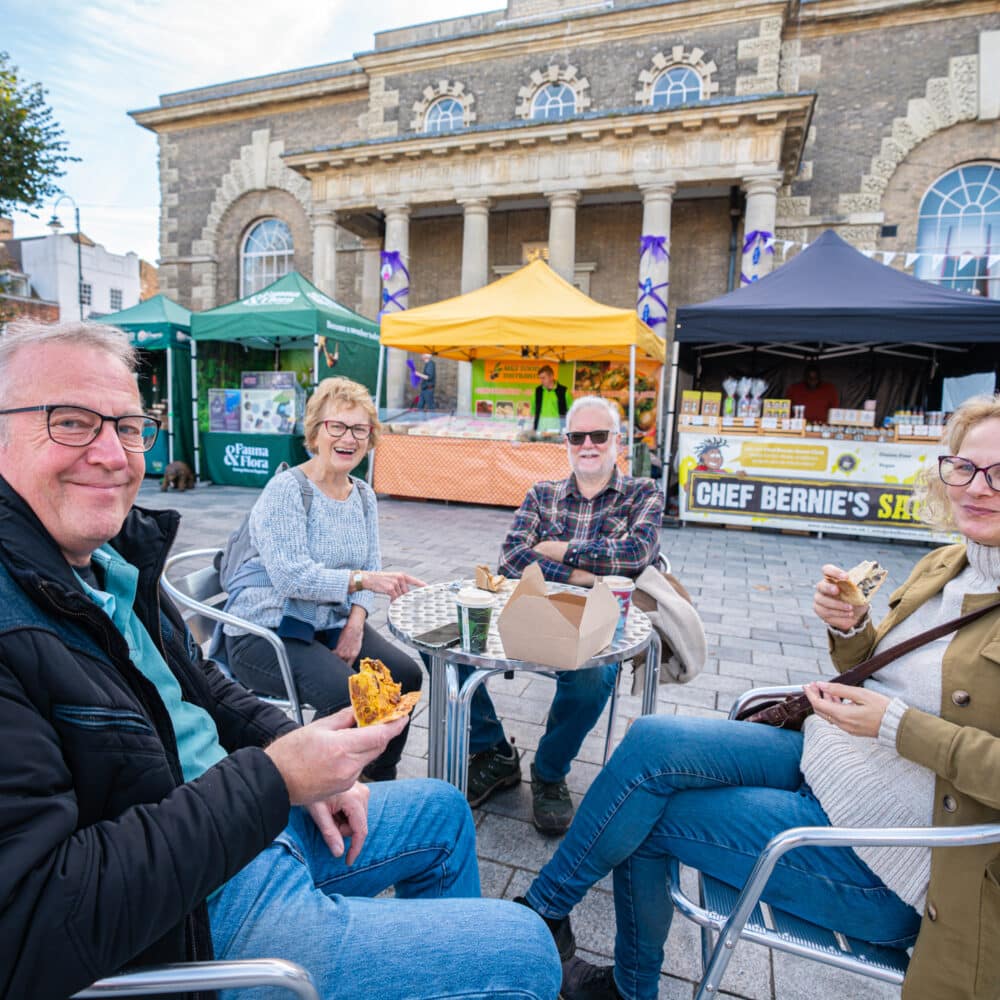 Customers at Salisbury Vegan Market on Guildhall Square by Vegan Fairs