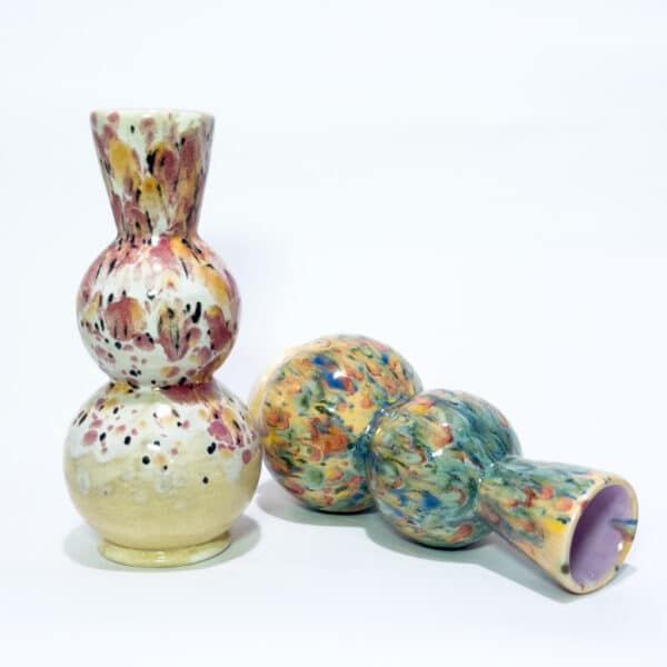 Short bud vases glazed with a multicolour mixed glaze