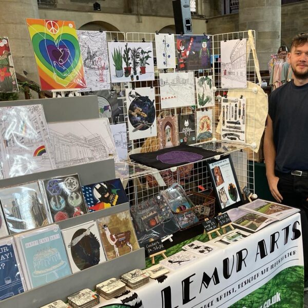 A picture of myself and the lemur arts stall in Leeds Craft & Flea.