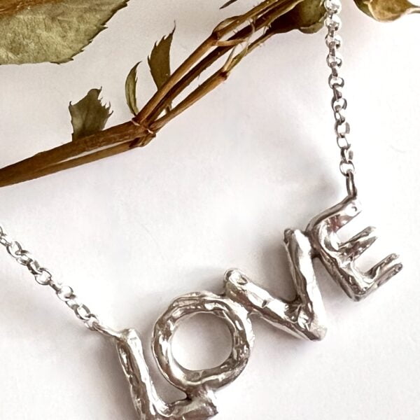 Organic alphabet letters forming the word LOVE in sterling silver Nicole Jansen Jewellery